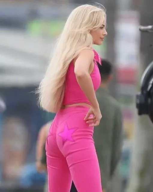 barbie pink vest maggot robbie wearing pink west from barbie