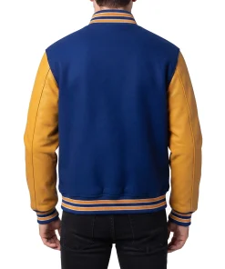 Wool blend varsity jacket with leather sleeves, ribbed trims and a snap front. Made by the factory and sold direct