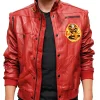 Two tone red and black leather bomber with ribbed trims and a front zip. Genuine hide, fully lined. Made by the factory.